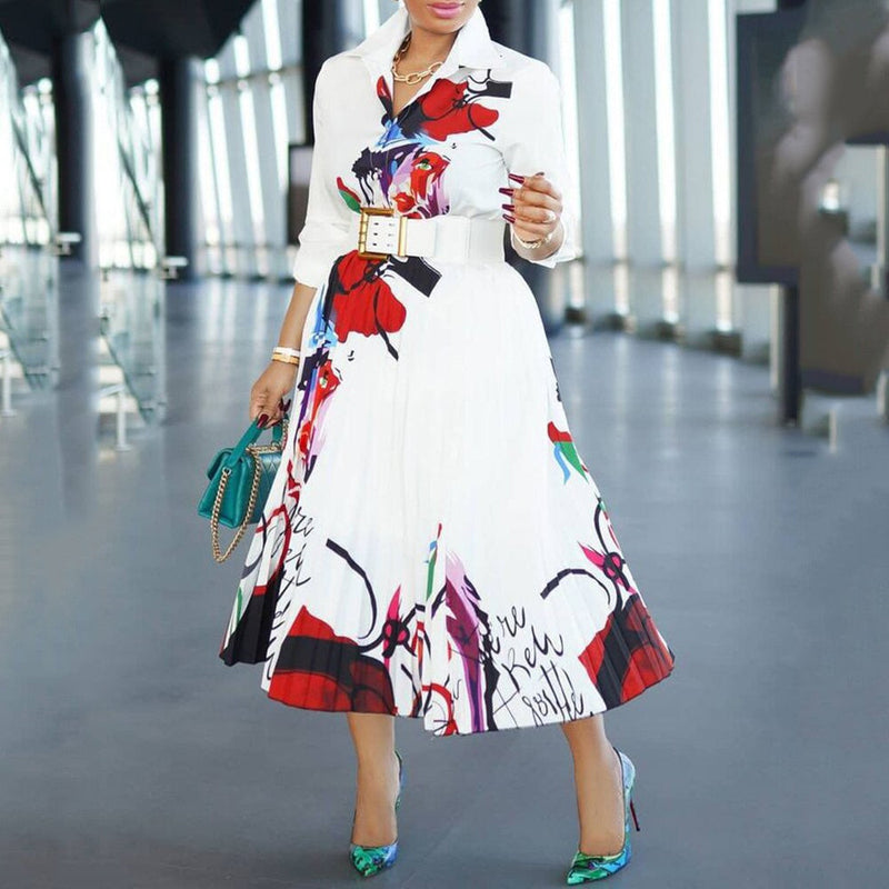 Beautiful pleated and high waisted floral dress.